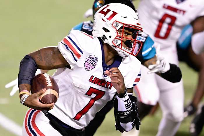 The Houston Texans select Liberty quarterback, Malik Willis, with the first pick in this 2022 scenario